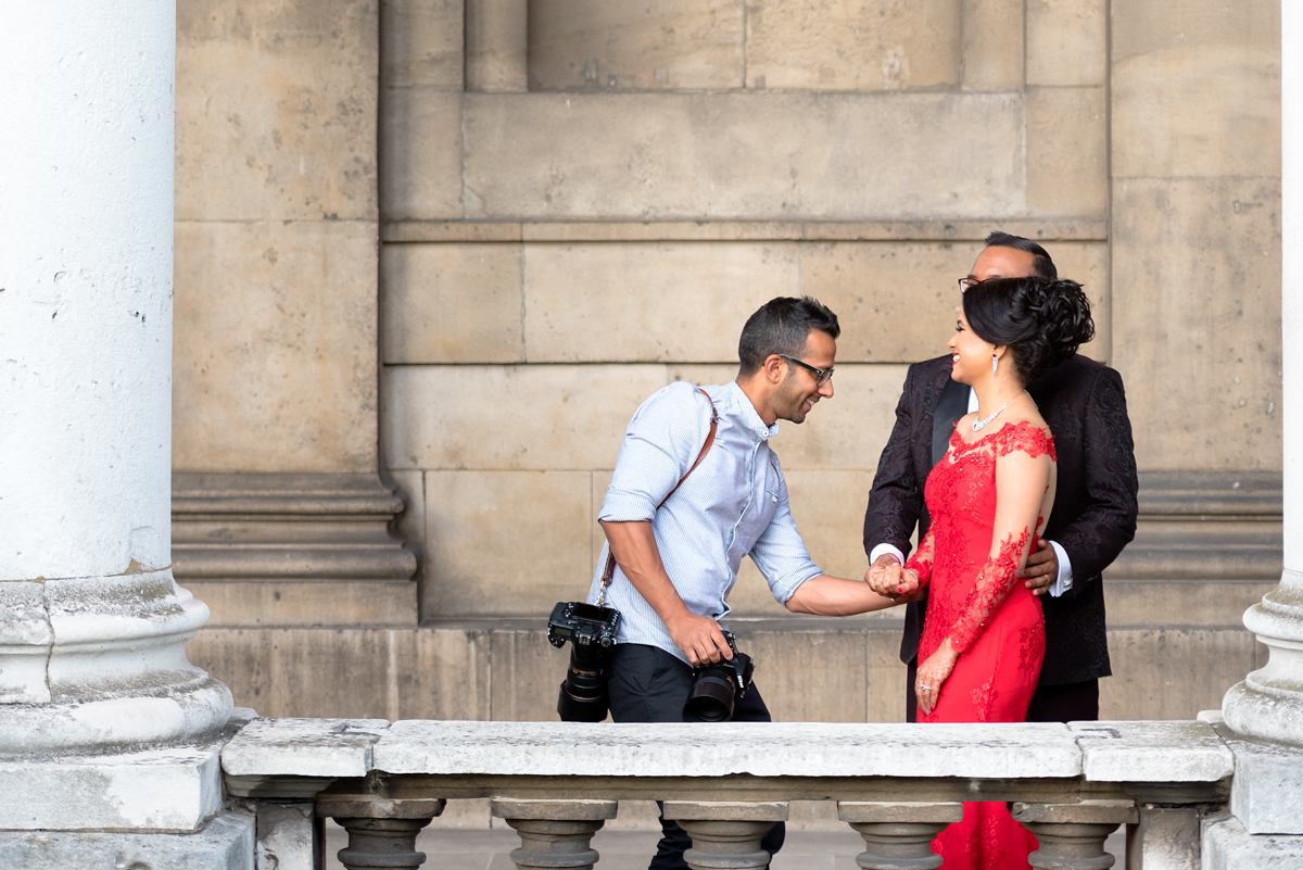 Photographer and a wedding couple