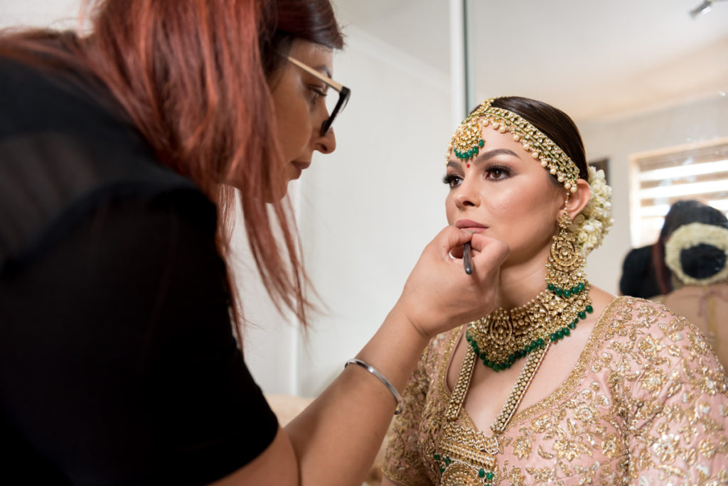 Gini Bhogal, one of the best Asian bridal makeup artists, in action