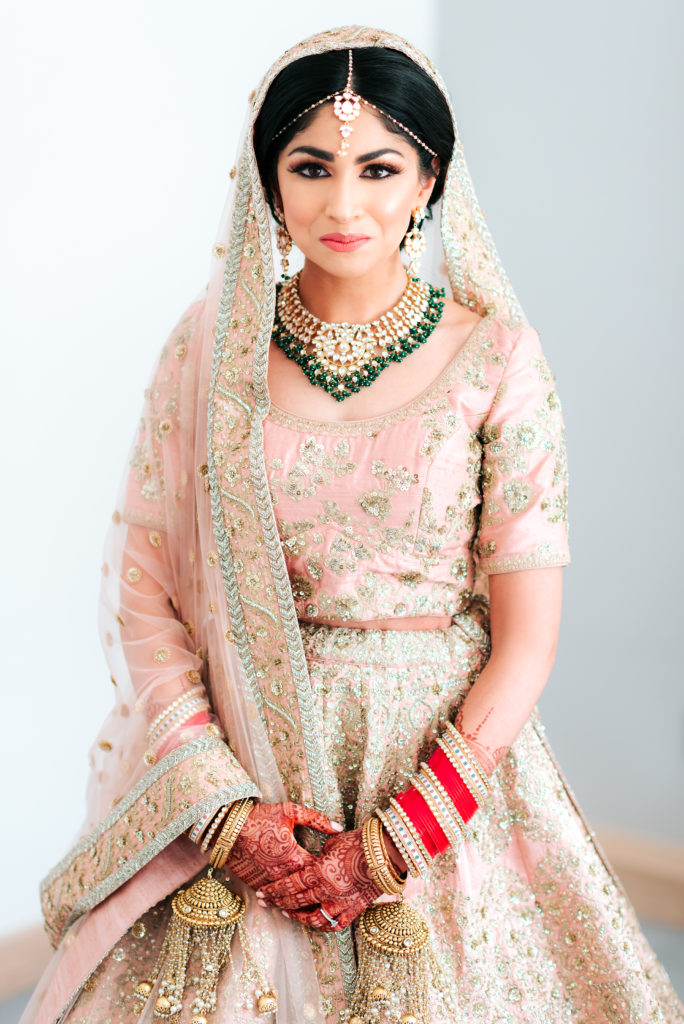 bride Alisha wearing Pink Sabyasachi