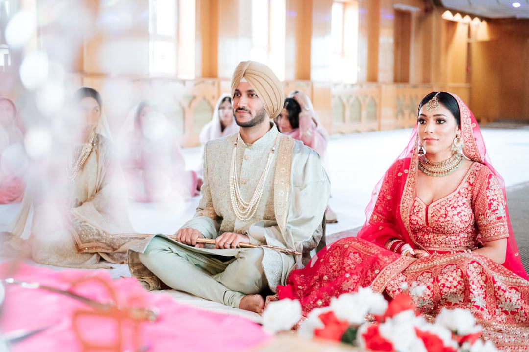 Sikh couple during ceremony 722 High Road Ilford 