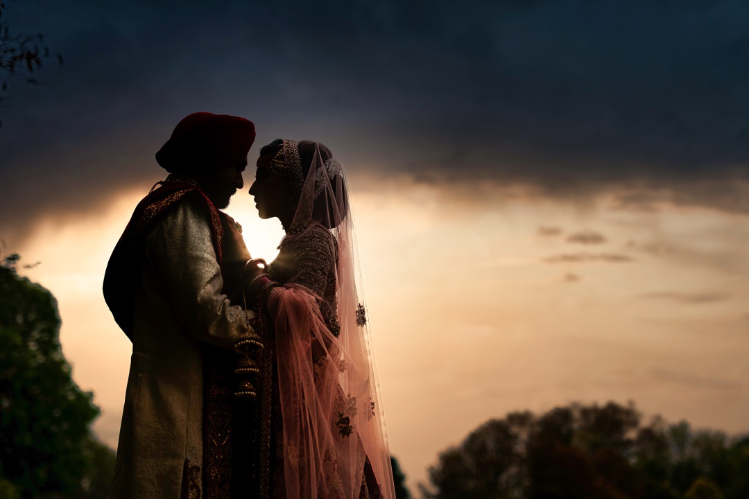 Sikh couple sunset photo