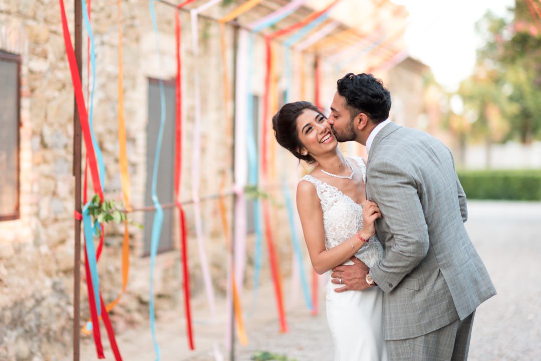 happy Asian couple at Castell de Caramany Wedding